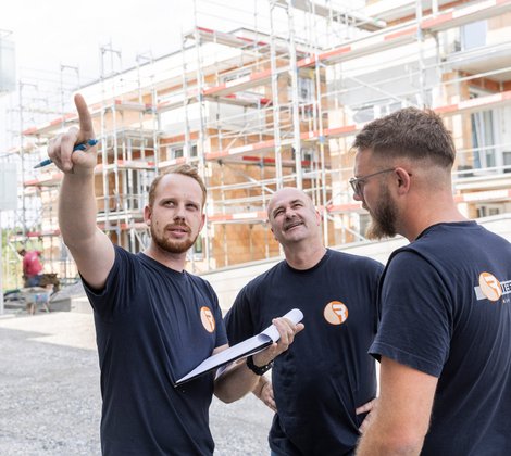 Mitarbeiter von Rieber Haustechnik auf einer Baustelle